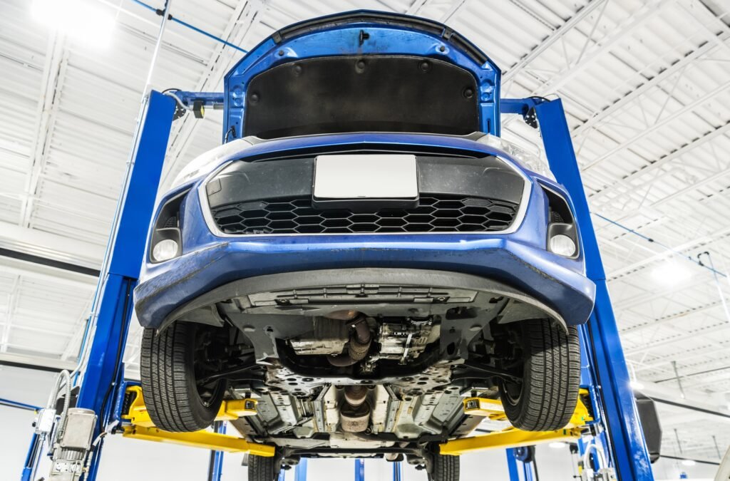 Vehicle on an Automotive Lift During Maintenance